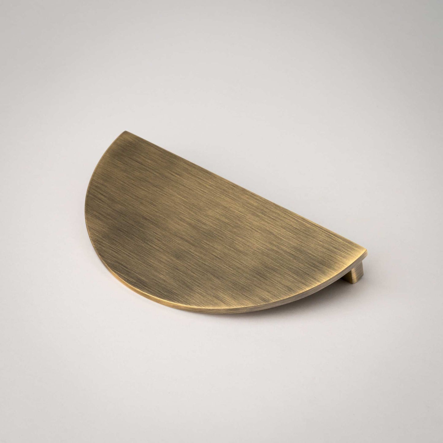 Demi Lune, Solid Brass Half Moon Cabinet PullsOur handmade Demi Lune cabinet handle is designed to be mounted in pairs to form a full circle or mounted horizontally as a half moon. In either orientation, it exudpullDemi Lune, Solid Brass Half Moon Pulls
