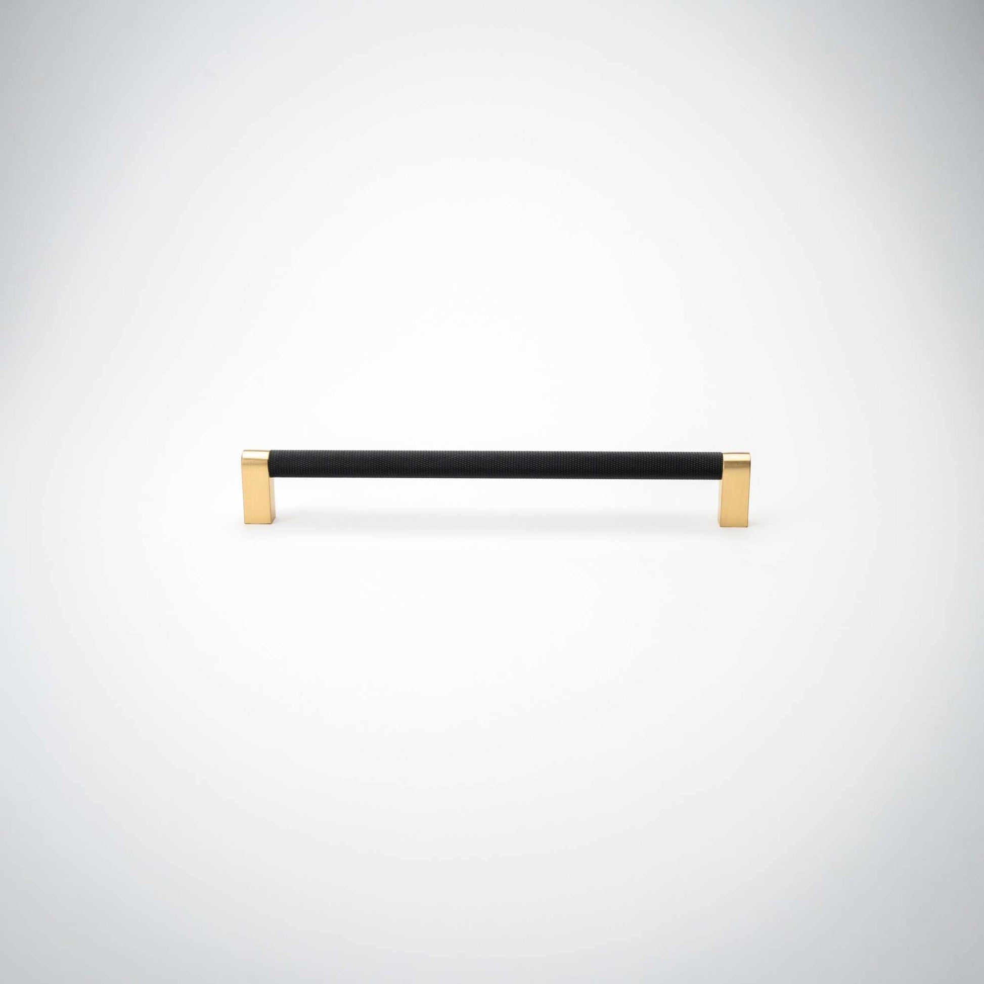 Bold, Black & Gold Knurled Cabinet PullsGo BOLD in your home!Our Bold, Black and "gold" cabinet pull brings a modern feel to your cabinetry. Its two-toned style is visually fresh, while its knurled matpullBold, Black & Gold Knurled Solid Brass Cabinet Pulls