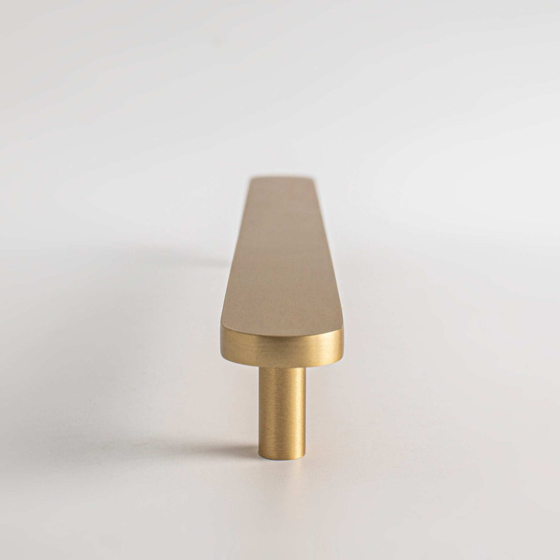 Studio photograph of Orbital, Solid Brass Appliance Pulls.