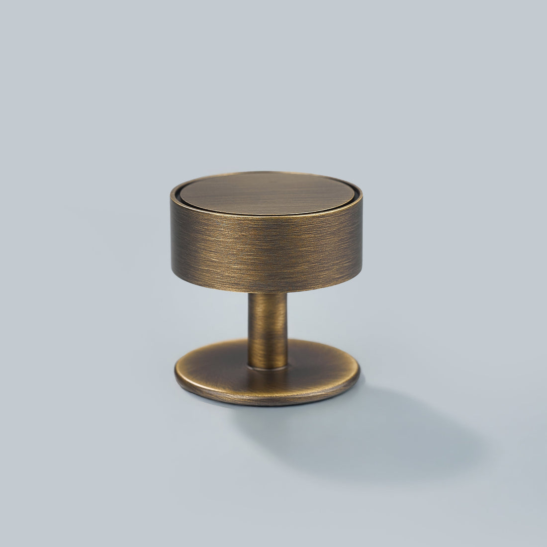 Studio photograph of Gateau, Solid Brass Knobs.