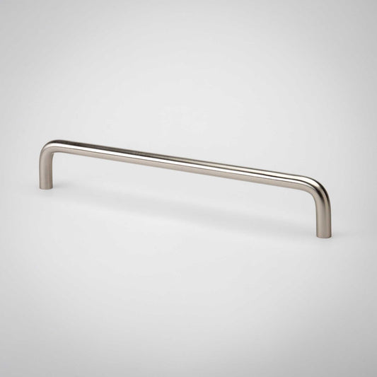 Arch cabinet pull showing its continuous bent-bar form
