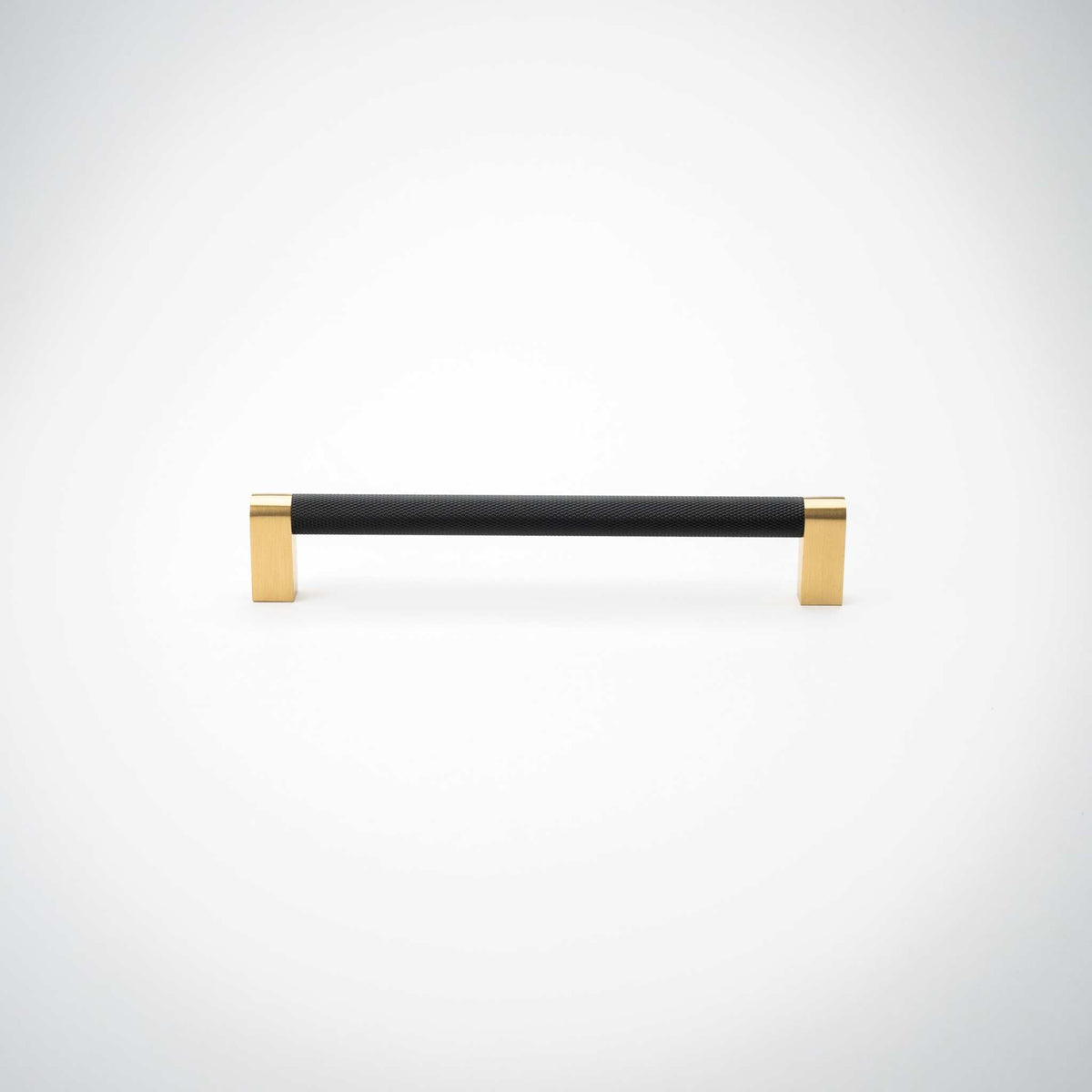 Bold cabinet pull showing its two brass mounting feet