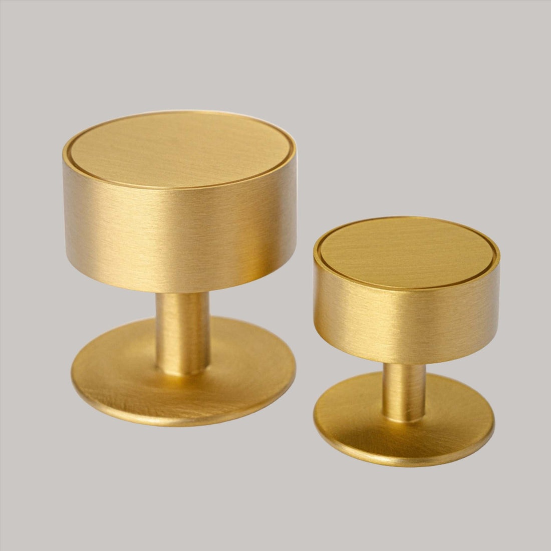 Studio photograph of Gateau, Solid Brass Knobs.