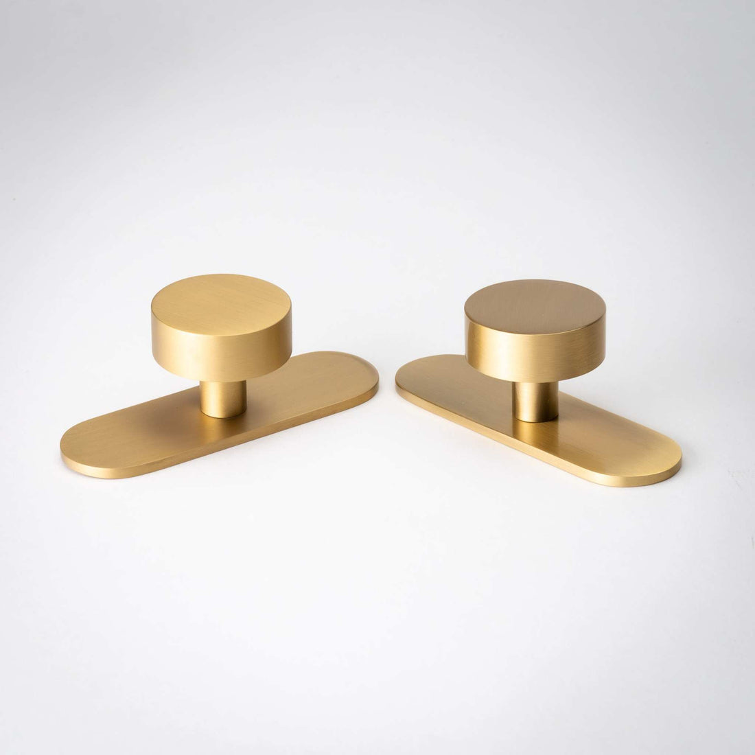Studio photograph of Orbital Knob, Solid Brass Cabinet Knobs.