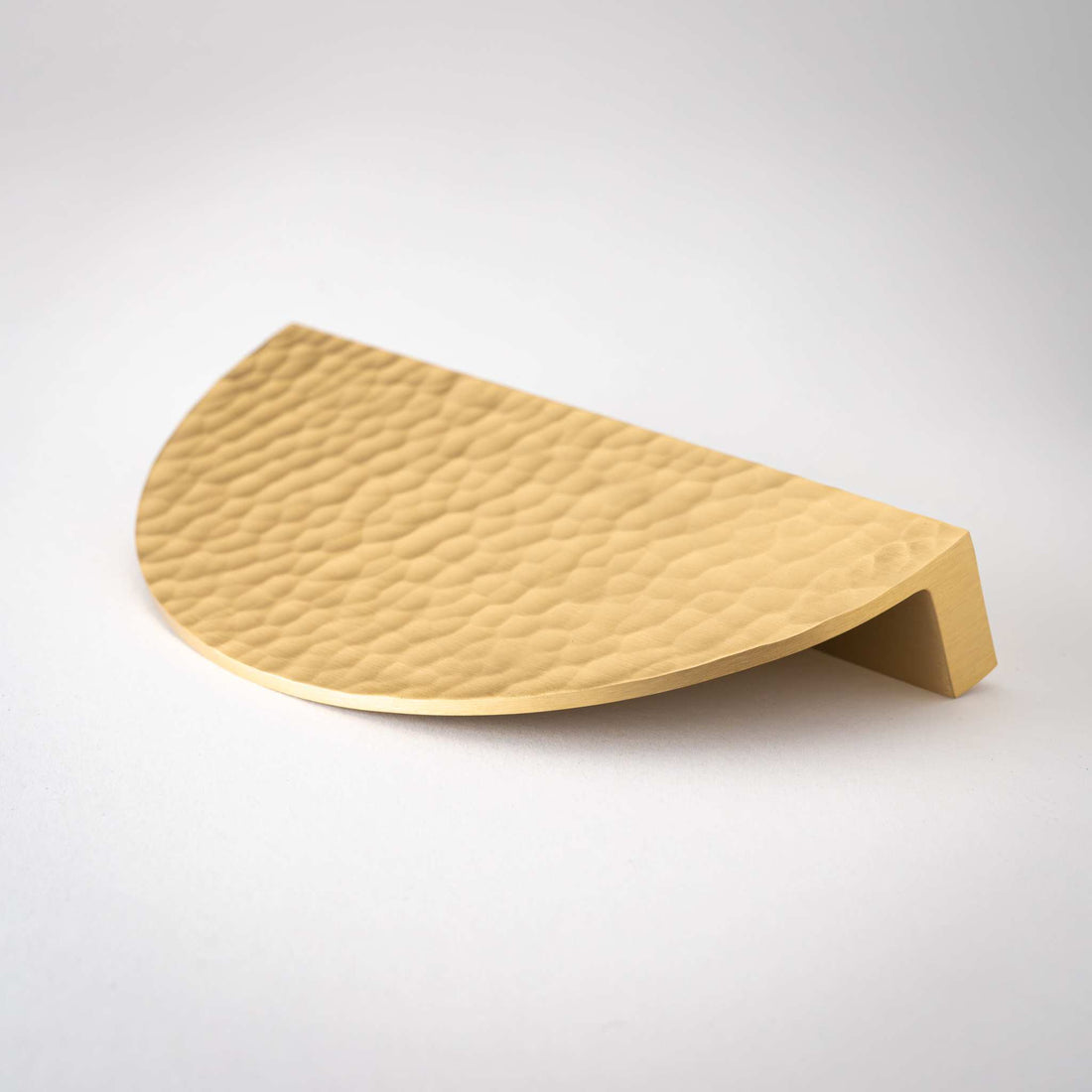 Studio photograph of Hammered Demi Lune, Solid Brass Half Moon Cabinet Pulls.
