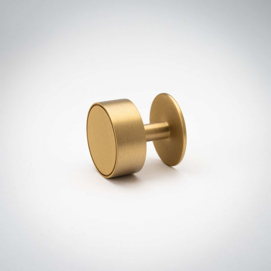 Studio photograph of Gateau, Solid Brass Knobs.