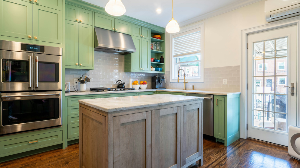 Kitchen With Mint Green Inset Cabinets And Stainless Steel Appliances