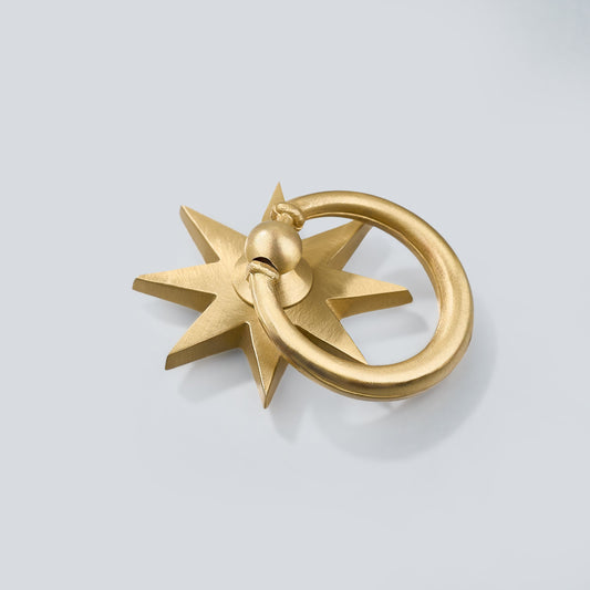 Orah brass drop pull viewed at an angle