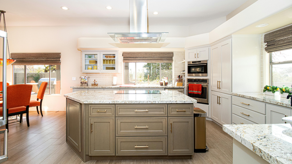 Modern kitchen interior with custom cabinetry and door handles