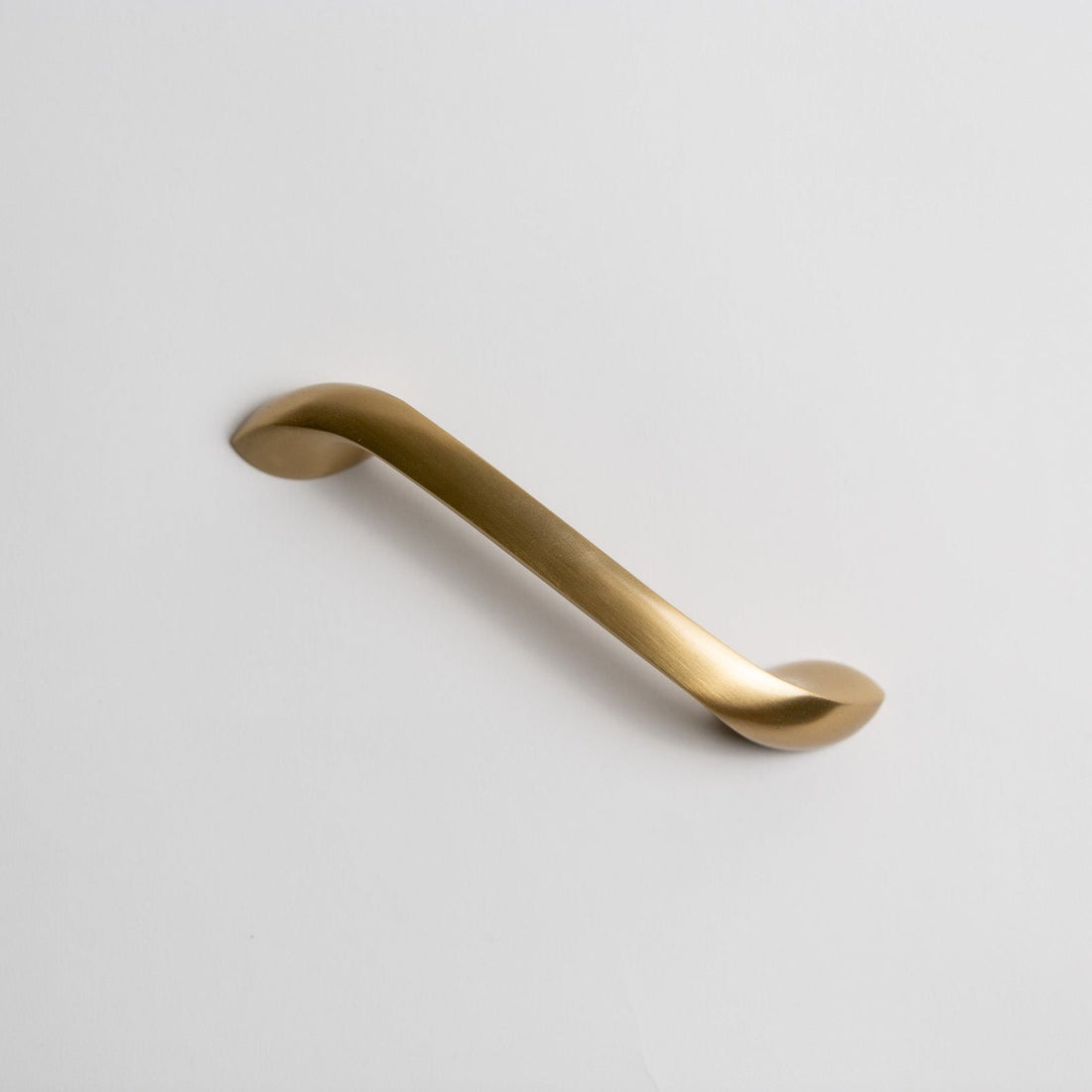 Studio photograph of Twist, Solid Brass Appliance Pulls.