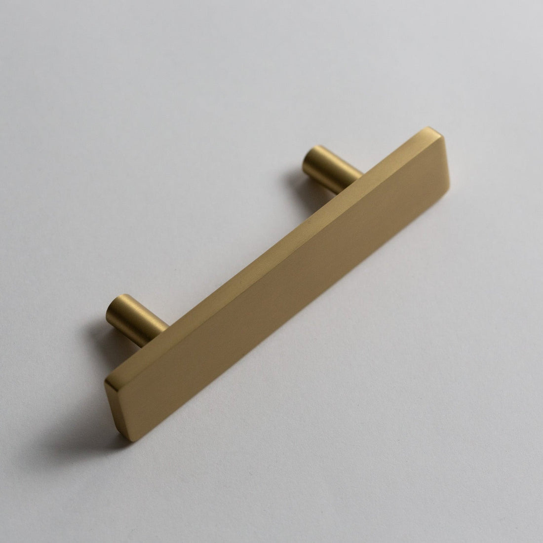 Auburn cabinet pull showing its face and supports