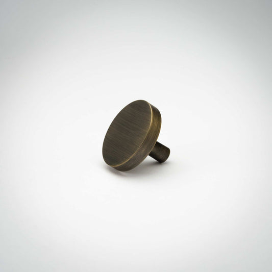 Rondelle knob with a dark brushed finish