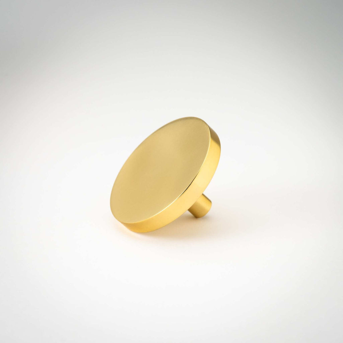 Rondelle knob in lacquered Polished Brass