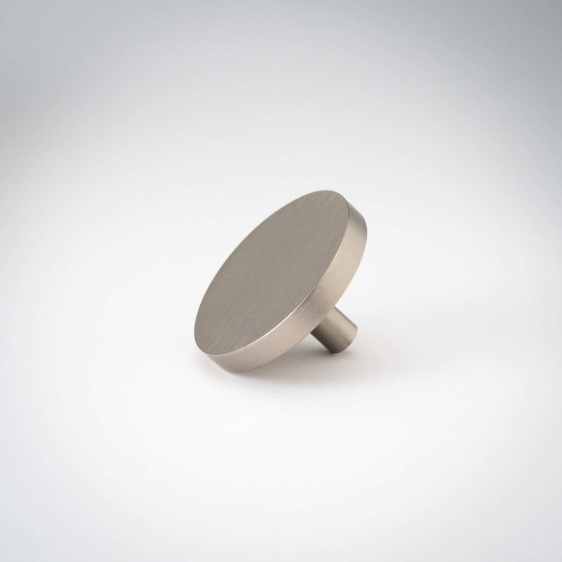 Rondelle cabinet knob in Satin Nickel with matte lacquer
