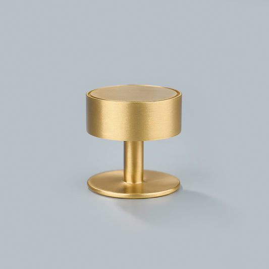 Studio photograph of Gateau, Solid Brass Knobs.