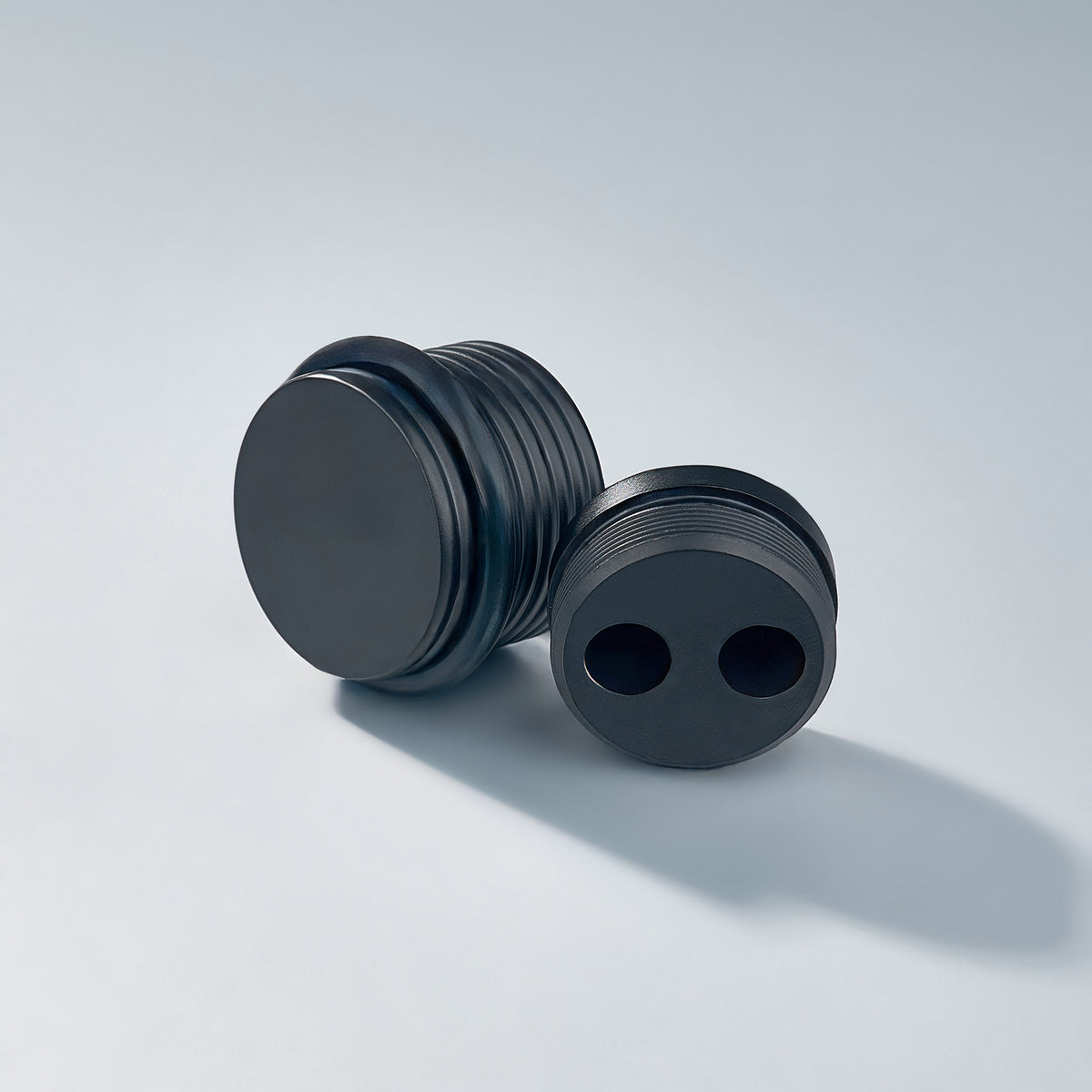 Bastion - Knurled Ring Solid Brass Door Stops in matte black