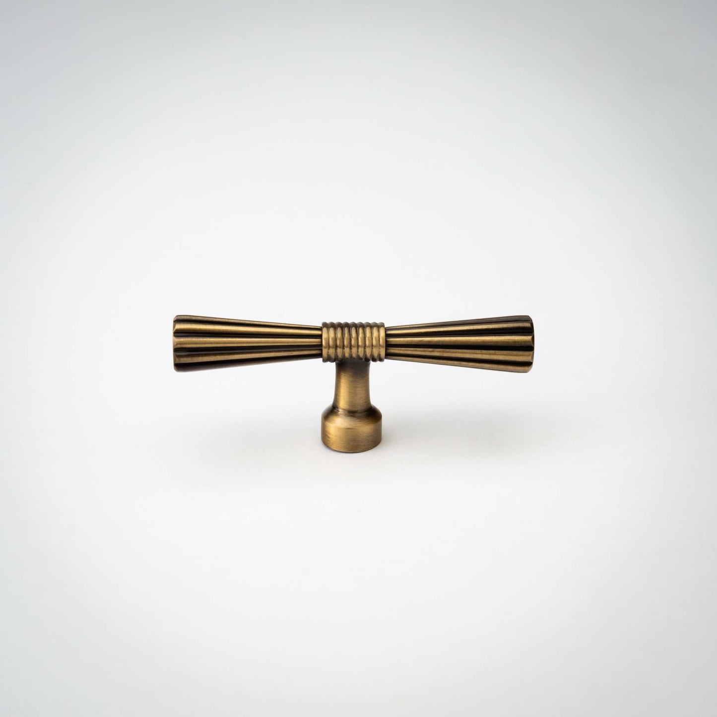 Beau, Antique Brass Cabinet Knob Simple elegance in a minimalist yet modern design, Beau elevates a space with both visual and tactile textures that draws attention without distracting from the sKnobBeau, Antique Brass Knob