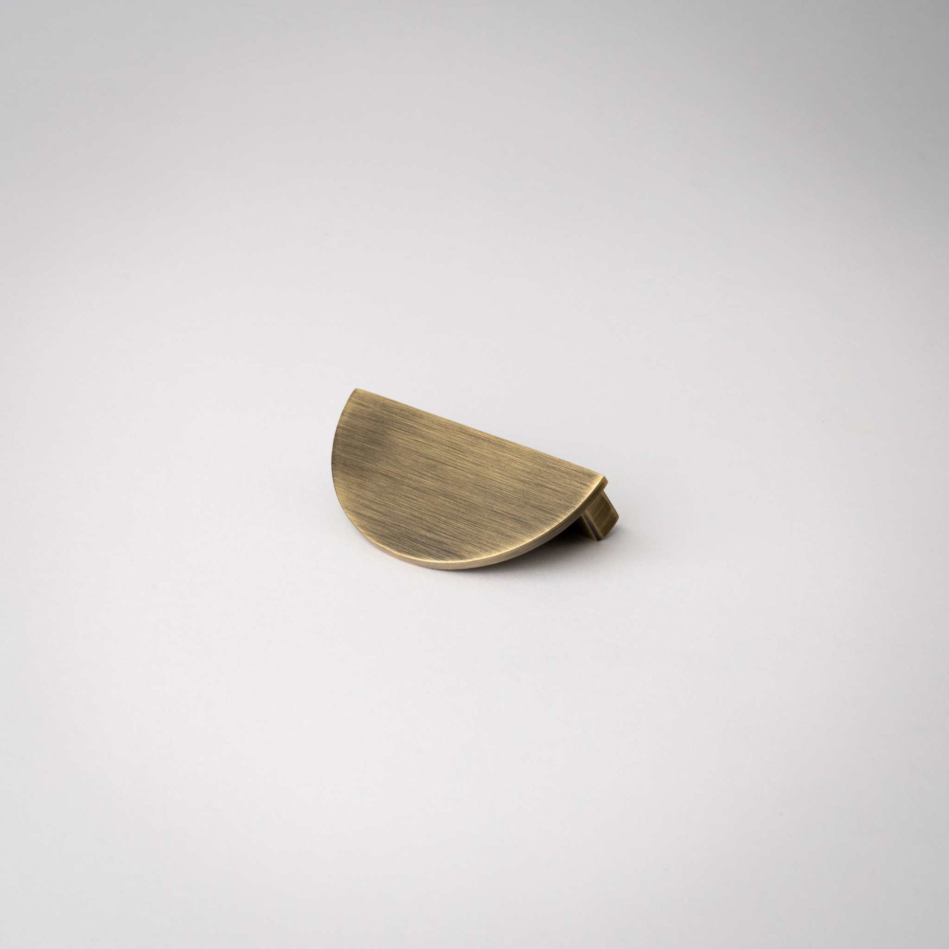 Demi Lune, Solid Brass Half Moon Cabinet PullsOur handmade Demi Lune cabinet handle is designed to be mounted in pairs to form a full circle or mounted horizontally as a half moon. In either orientation, it exudpullDemi Lune, Solid Brass Half Moon Pulls