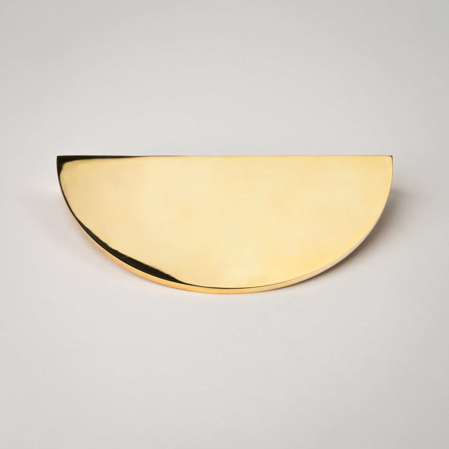 Demi Lune, Solid Brass Half Moon Cabinet PullsOur handmade Demi Lune cabinet handle is designed to be mounted in pairs to form a full circle or mounted horizontally as a half moon. In either orientation, it exudpullDemi Lune, Solid Brass Half Moon Pulls