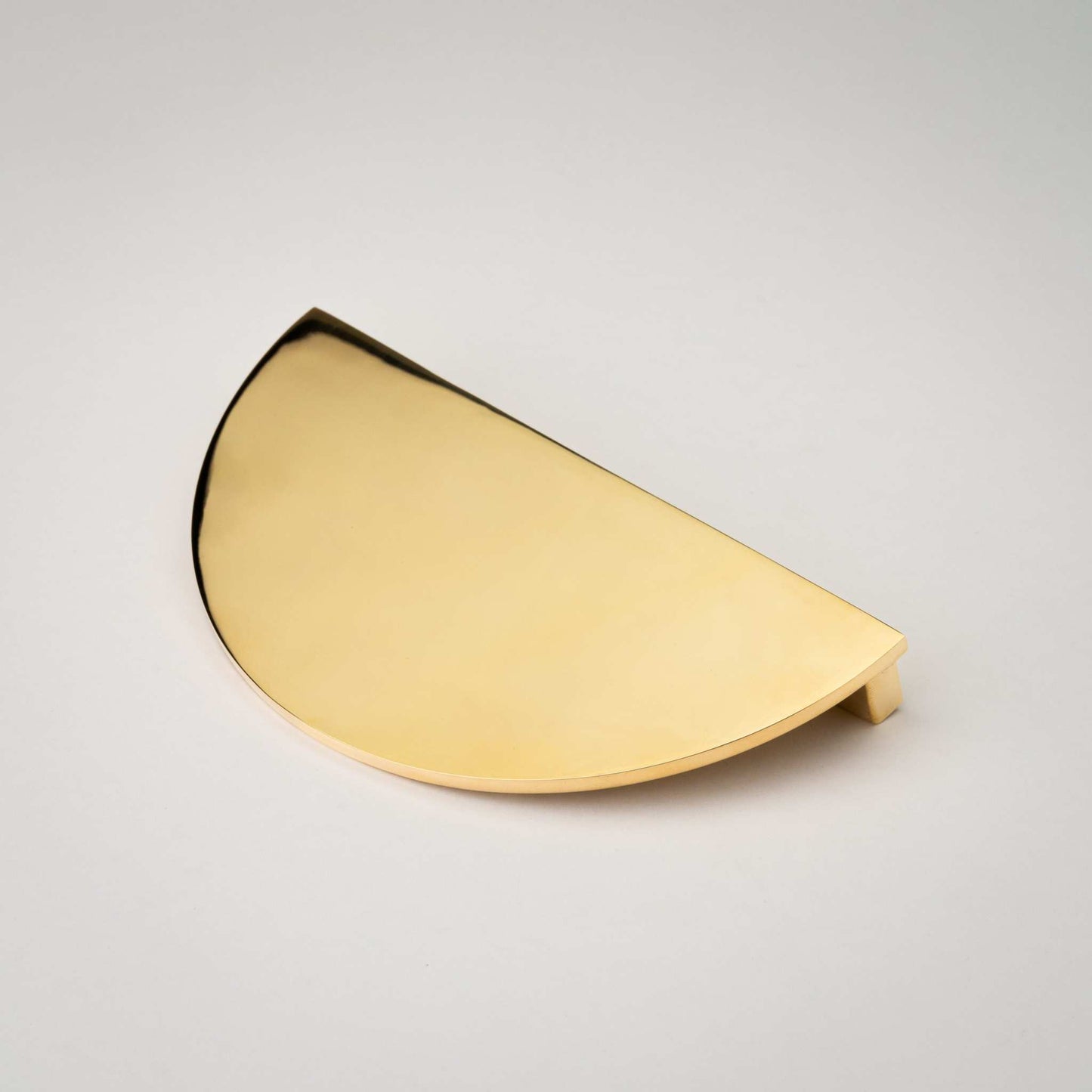 Demi Lune, Solid Brass Half Moon Cabinet PullsOur handmade Demi Lune cabinet handle is designed to be mounted in pairs to form a full circle or mounted horizontally as a half moon. In either orientation, it exudpullDemi Lune, Solid Brass Half Moon Pulls