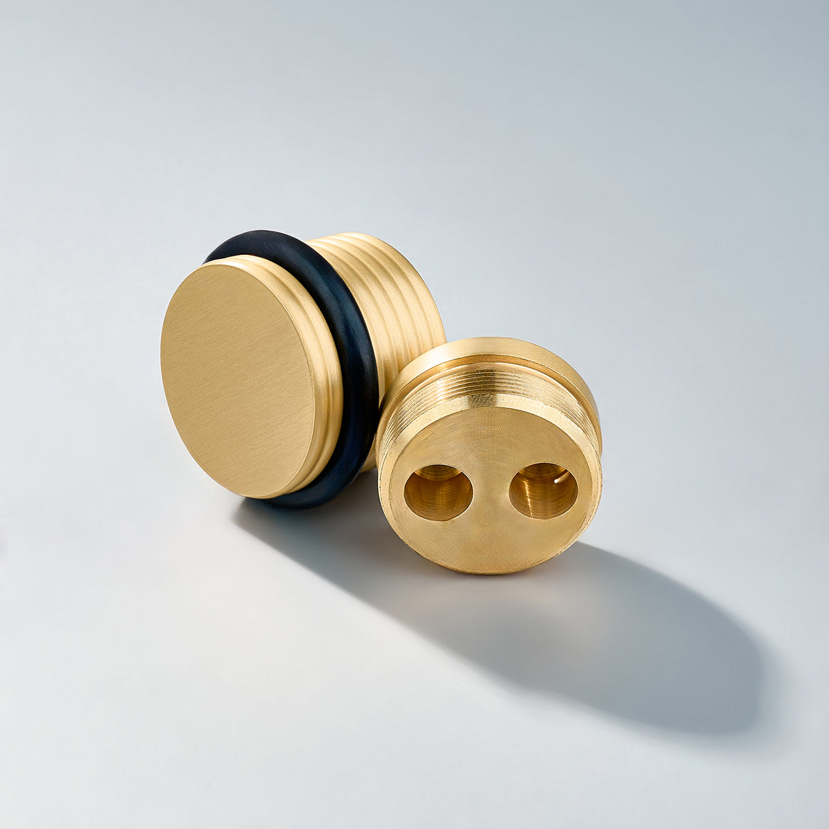 Bastion - Knurled Ring Solid Brass Door Stops, studio product view