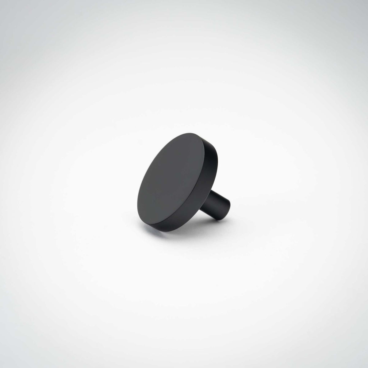 Rondelle Cabinet Knobs, showing round head and short mounting stem.