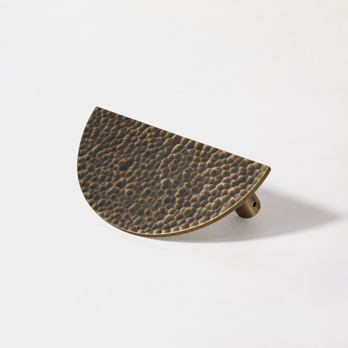 Hammered Demi Lune door handle in Antique Brass matte lacquer, single angled handle; AI-edited finish visualization