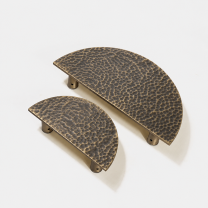 Hammered Demi Lune door handle in Antique Brass matte lacquer, 6-inch and 9-inch size comparison; AI-edited finish visualization