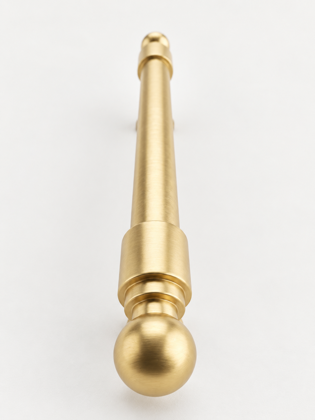 Bishop cabinet pull in Satin Brass Matte Lacquer, AI-assisted studio product image
