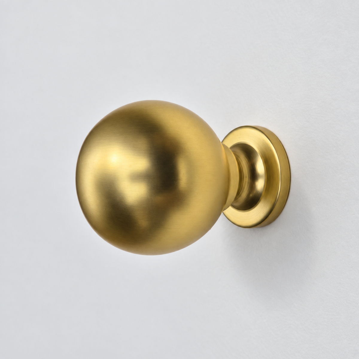 Bishop knob in Satin Brass Matte Lacquer, AI-assisted studio product image