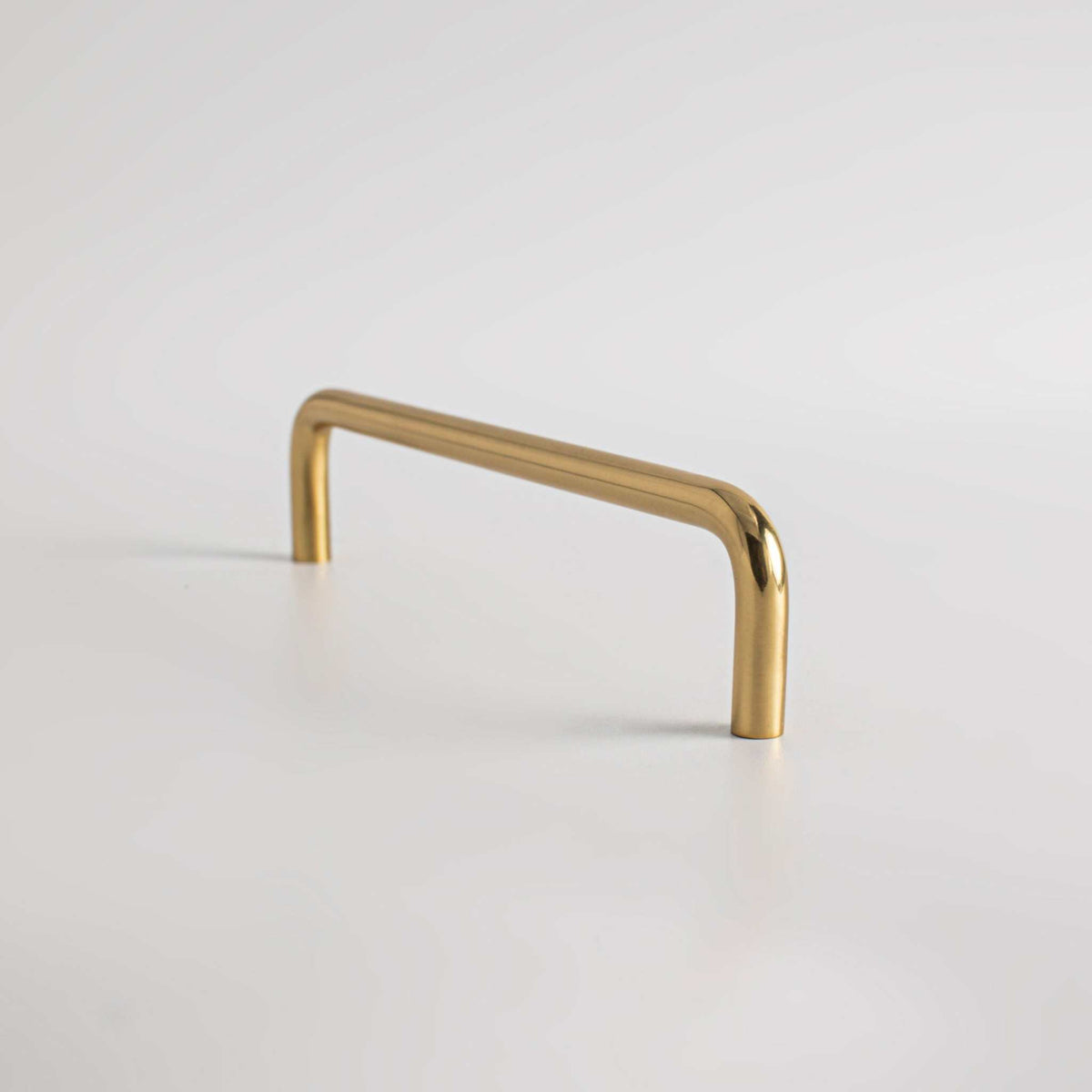 Arch Wire Cabinet Pulls, showing curved bar and two mounting feet.