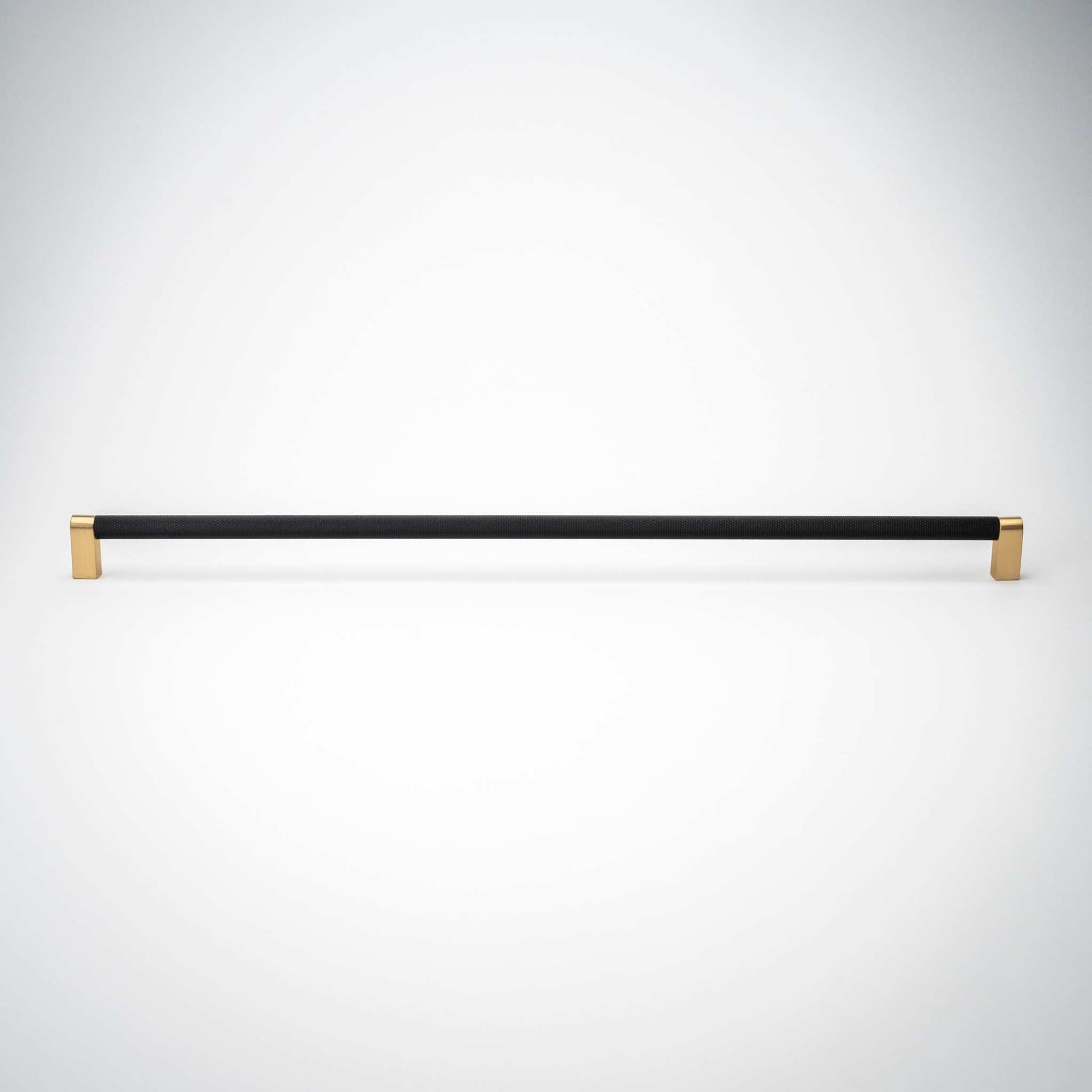 Bold, Black & Gold Knurled Cabinet PullsGo BOLD in your home!Our Bold, Black and "gold" cabinet pull brings a modern feel to your cabinetry. Its two-toned style is visually fresh, while its knurled matpullBold, Black & Gold Knurled Solid Brass Cabinet Pulls