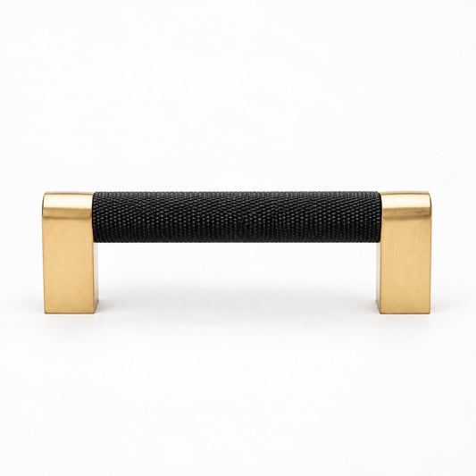Bold Black & Gold Knurled Cabinet Pulls, showing black bar and contrasting brass-colored mounting feet.