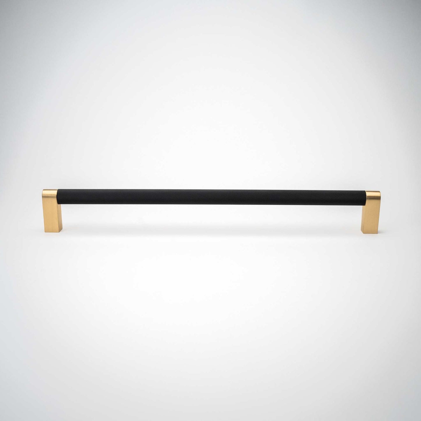 Bold, Black & Gold Knurled Cabinet Pulls Go BOLD in your home!Our Bold, Black and "gold" cabinet pull brings a modern feel to your cabinetry. Its two-toned style is visually fresh, while its knurled matpullBold, Black & Gold Knurled Solid Brass Cabinet Pulls