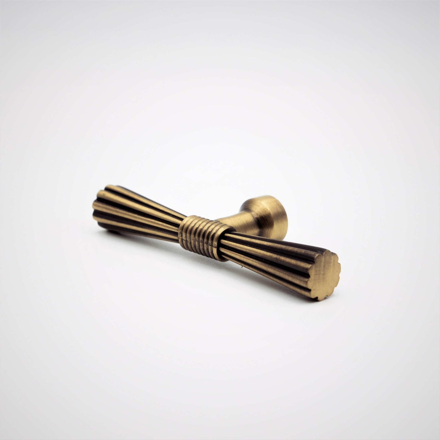Beau, Antique Brass Cabinet Knob Simple elegance in a minimalist yet modern design, Beau elevates a space with both visual and tactile textures that draws attention without distracting from the sKnobBeau, Antique Brass Knob