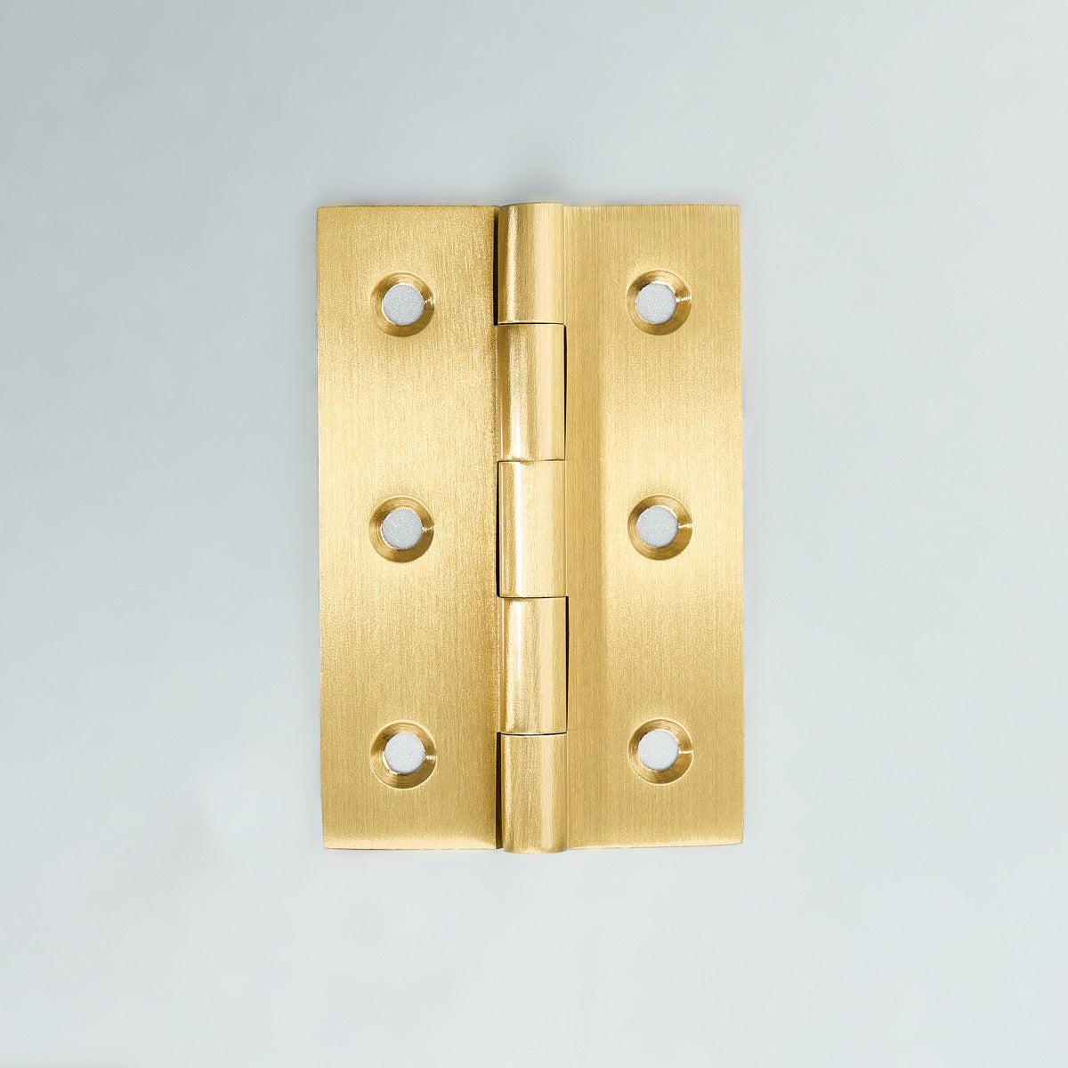 Original satin gold Loki hinge photograph 1; large Loki source reference