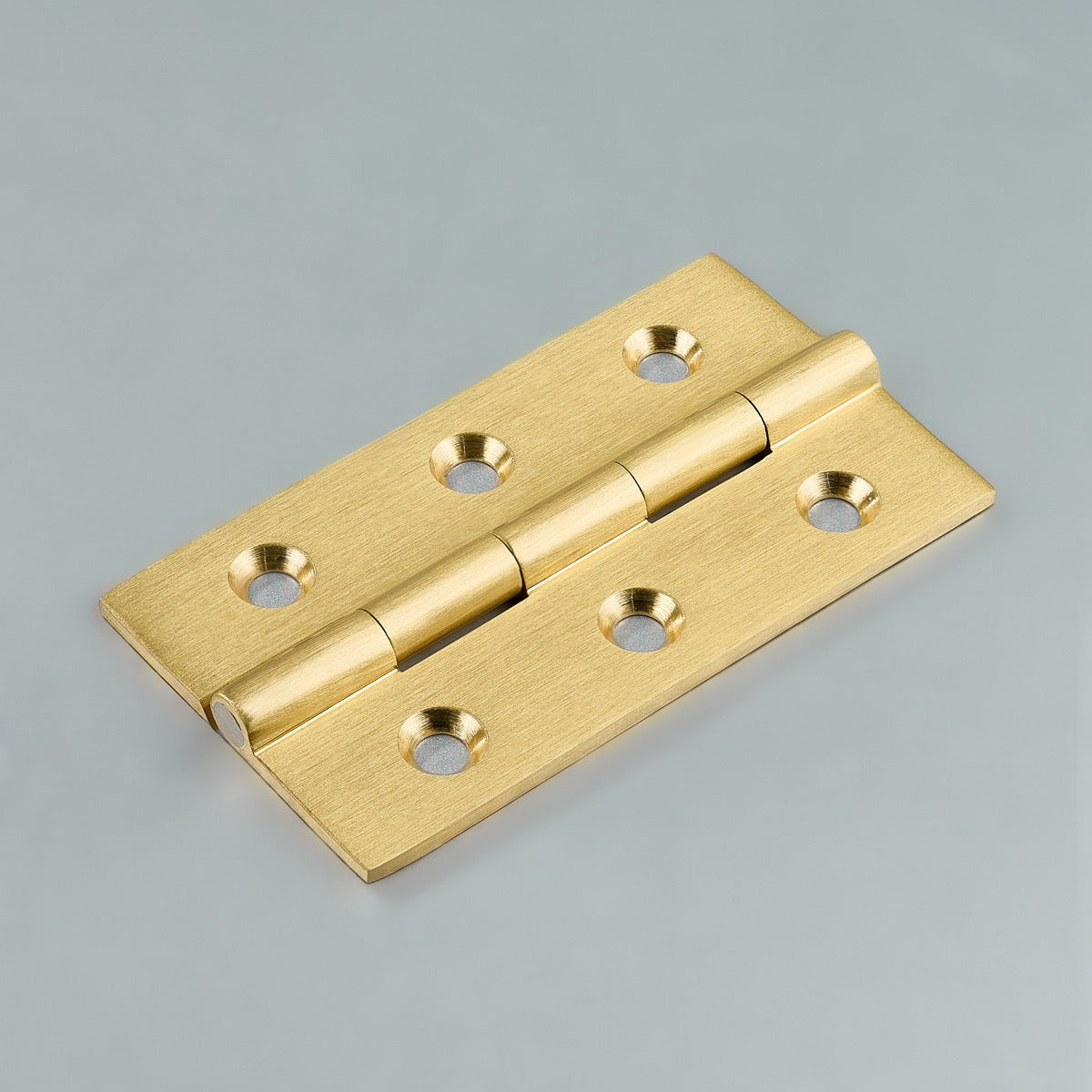 Original satin gold Loki hinge photograph 12; family reference, exact size not assigned
