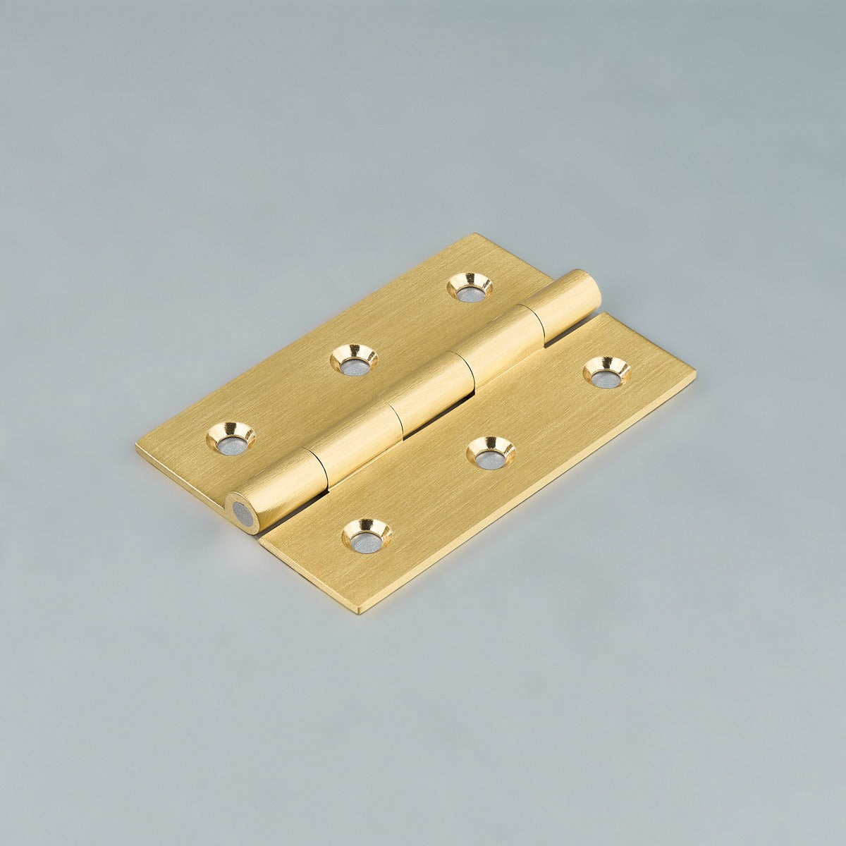 Original satin gold Loki hinge photograph 13; family reference, exact size not assigned