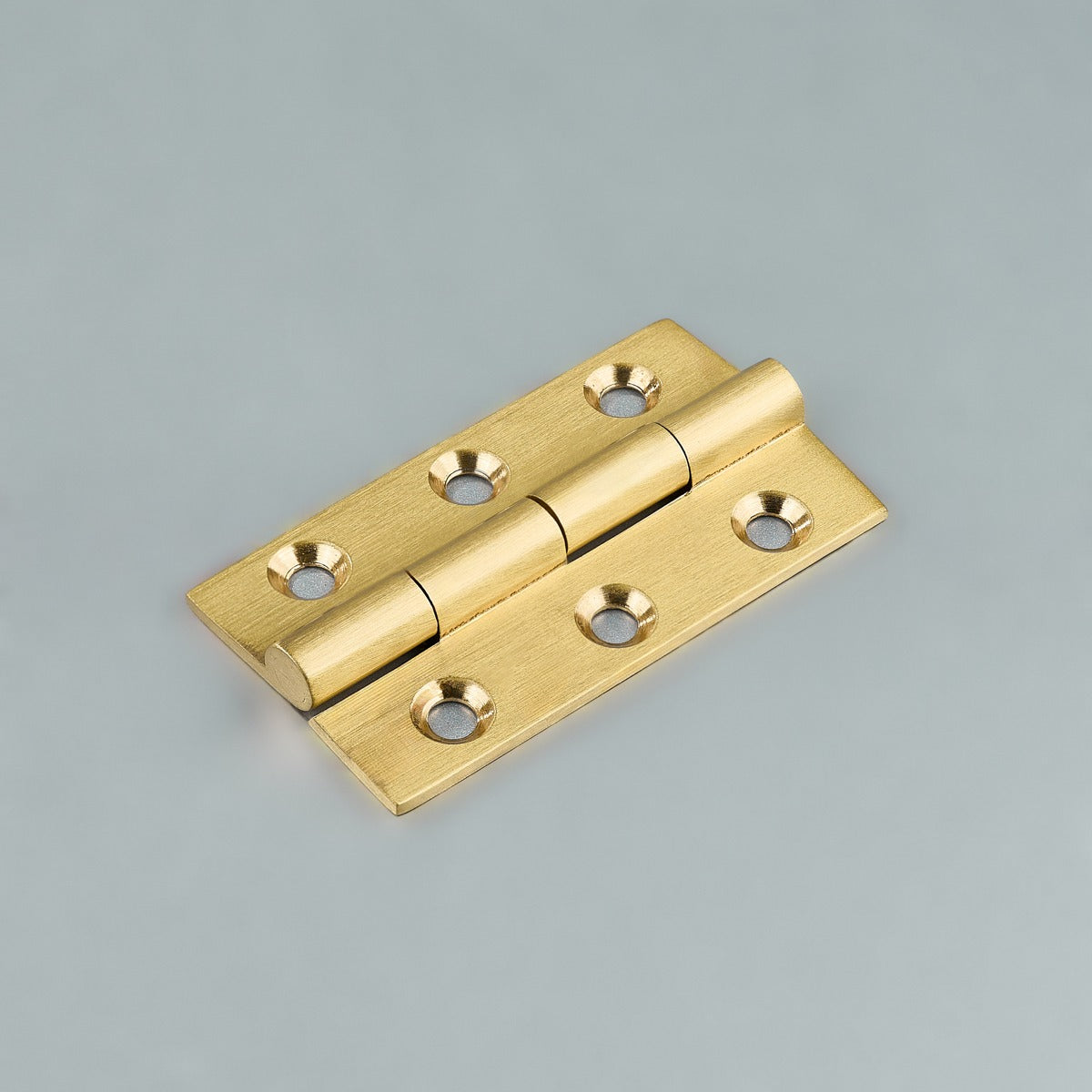 Original satin gold Loki hinge photograph 14; family reference, exact size not assigned
