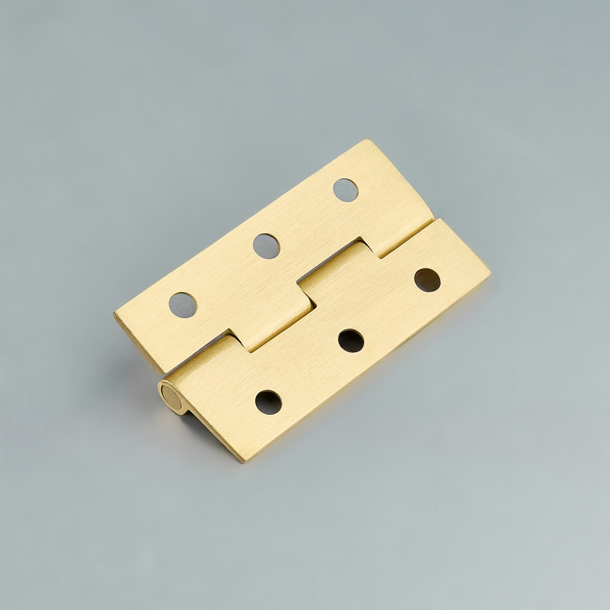 Original satin gold Loki hinge photograph 15; family reference, exact size not assigned