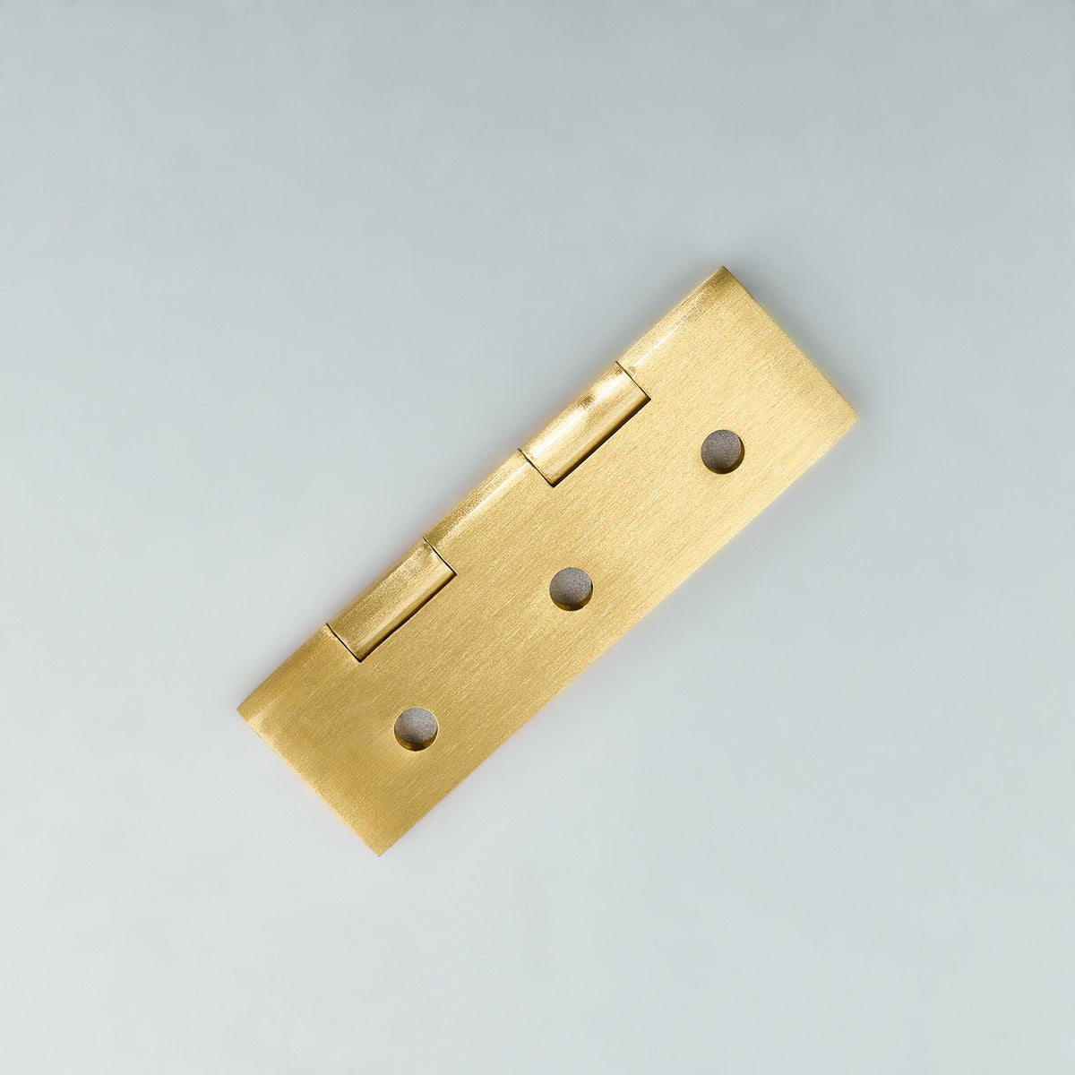 Original satin gold Loki hinge photograph 9; family reference, exact size not assigned